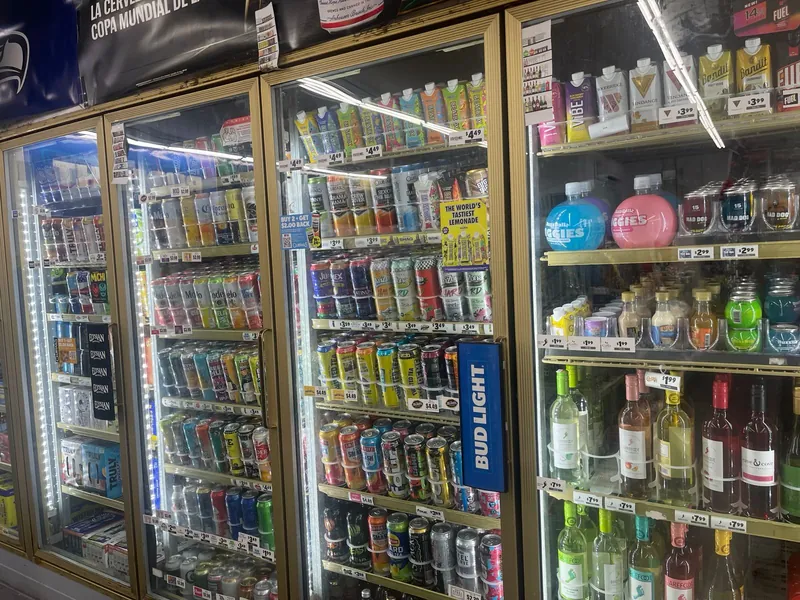 Coolers stocked with beer, craft beverages, ready-to-drink cans and wine