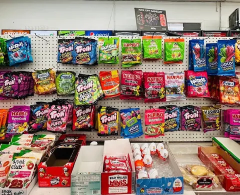 Colorful gummy candy and chocolate selection inside Midland Food Center